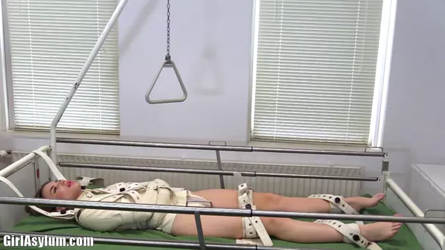 Poster: Girl Asylum – Oxana wild girl strapped down